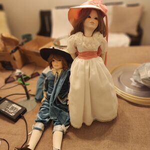 Elegant Porcelain Dolls with Hats